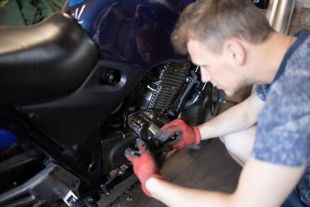 motorcycle engine repair in the garage diagnostics